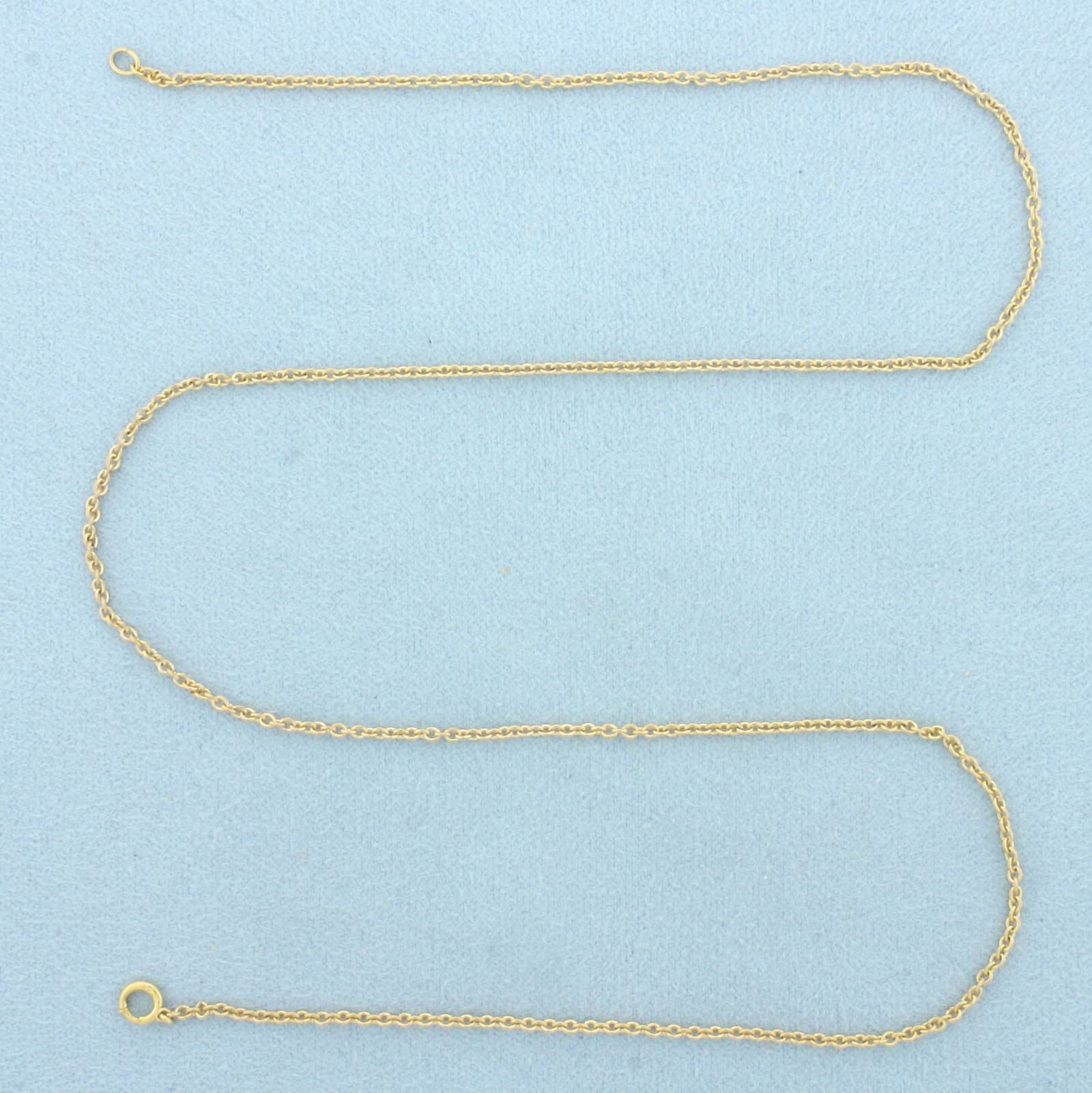18 Inch Cable Link Chain Necklace in 10k Yellow Gold: In 10k Yellow Gold. 18 inches long. 1.7mm wide. Spring clasp. 2.8g.