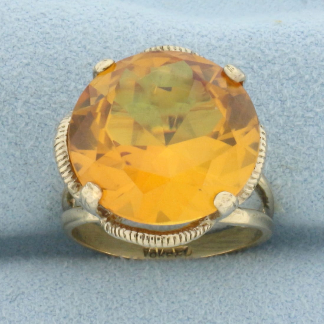 Vintage Citrine Statement Ring in 10k Yellow Gold: In 10k Yellow Gold. Contains one 15.8mm high quality natural Citrine gemstone, approximately 14cts, with intense color and excellent clarity. Size 6. 8.0g.