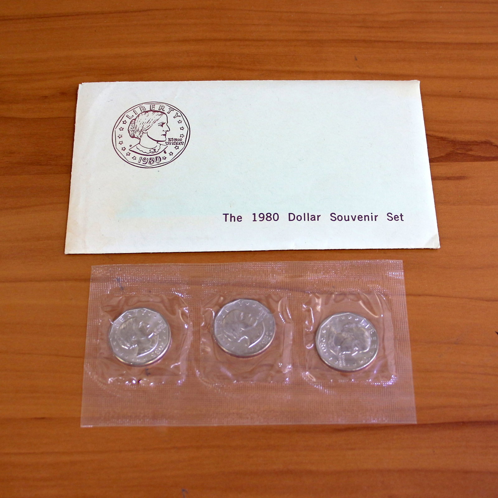US Mint Liberty Dollar Souvenir Set OGP: Contains three 1Liberty Dollars from 1979 or 1980. Set in original government envelope.