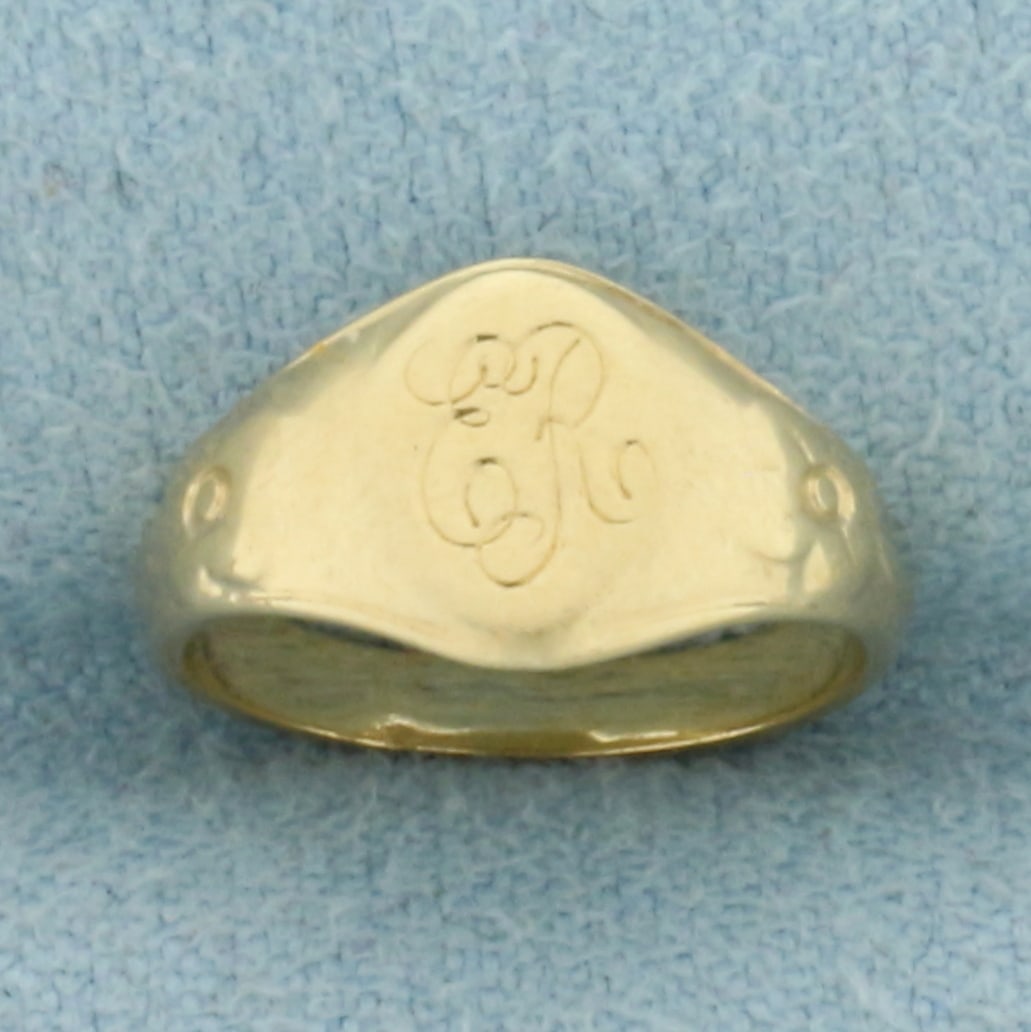 Antique Engraved Baby Ring in 14k Yellow Gold: In 14k Yellow Gold. 1/2 inch diameter. 7.3mm wide at widest. Engraved "ER". 1.3g.