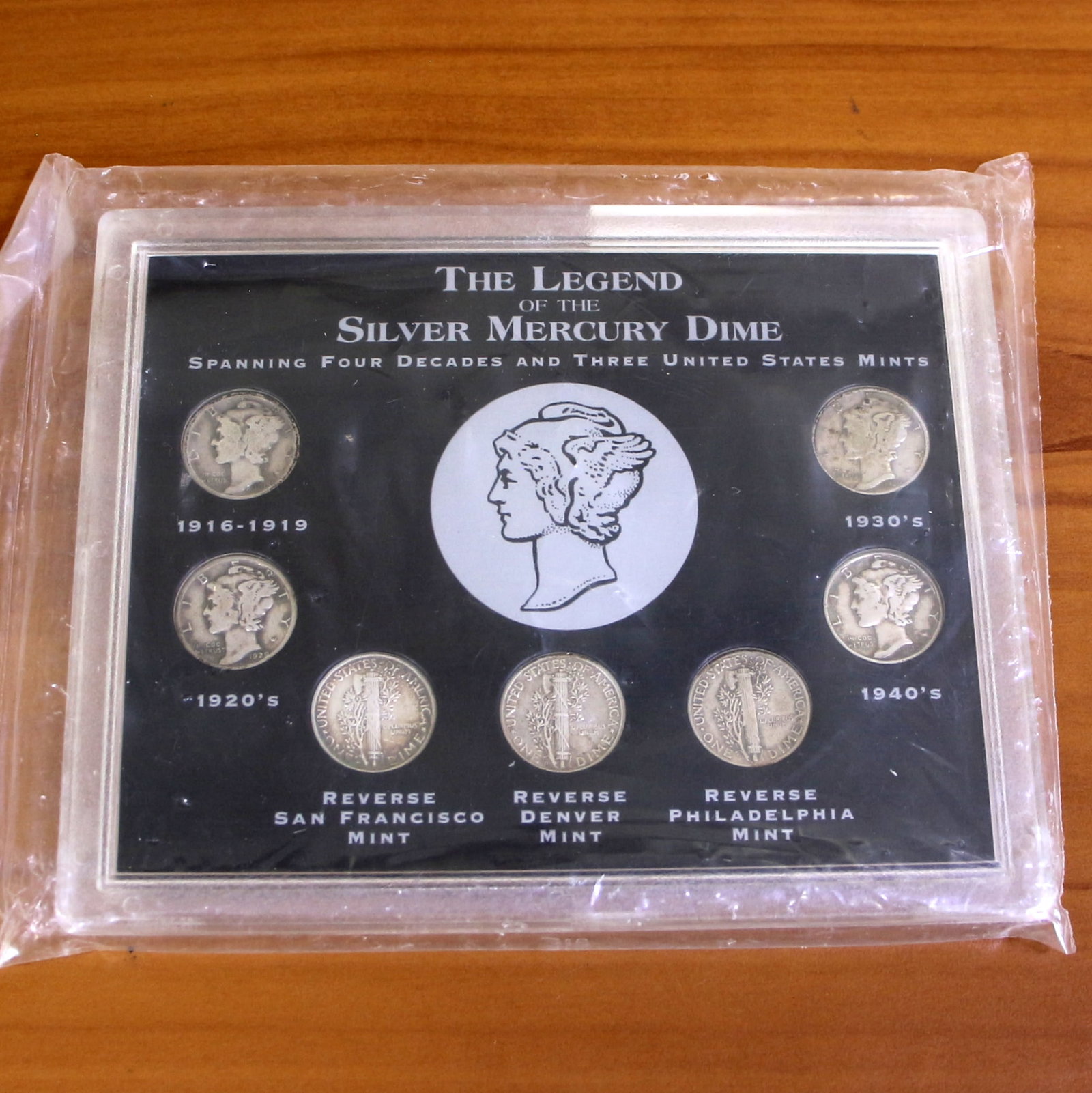 The Legend of Silver Mercury Dime Coin Collection: Contains 7 Mercury Dimes as shown in picture. With COA. Sealed packaging.