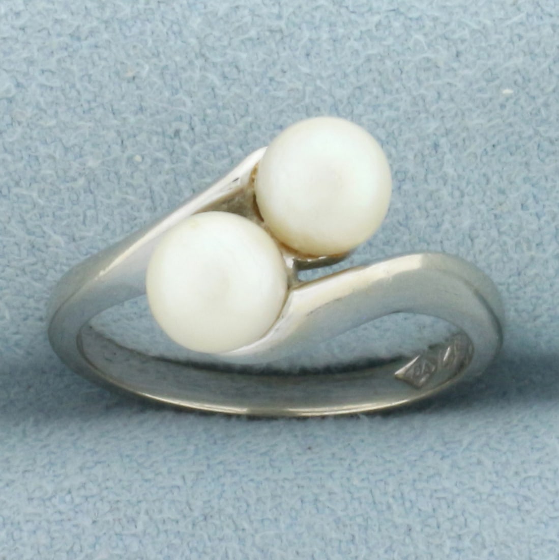 Cultured Pearl Toi Et Moi Ring in 14k White Gold: In 14k white gold. Contains 2 high quality 5.8mm cultured pearls with high luster. Size: 6.