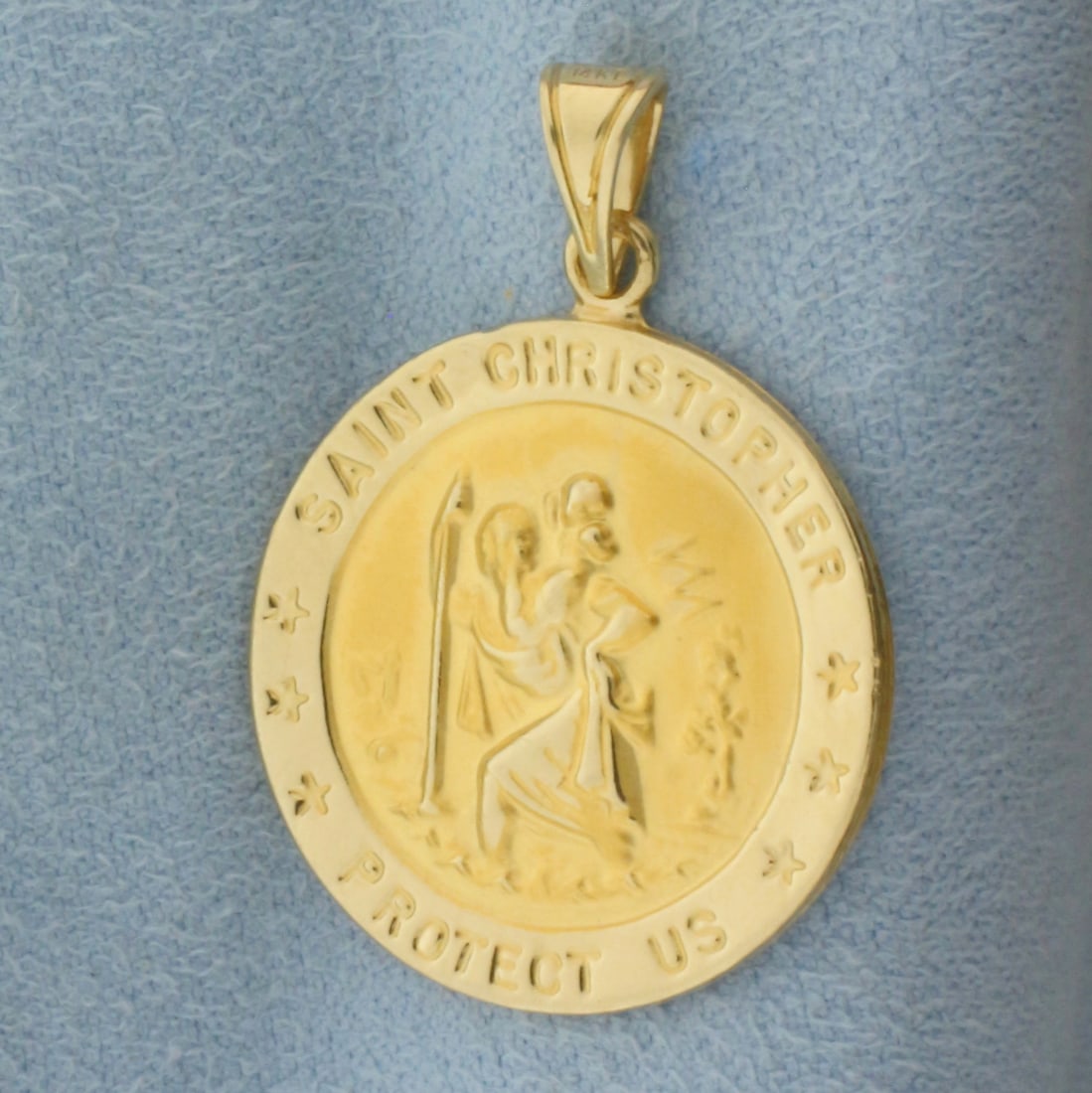 Saint Christopher Protect Us Pendant 14k Yellow Gold: In 14k Yellow Gold. 1 1/8 inch long (including bale). 7/8 inch wide. Can engrave name on back. 1.9g.