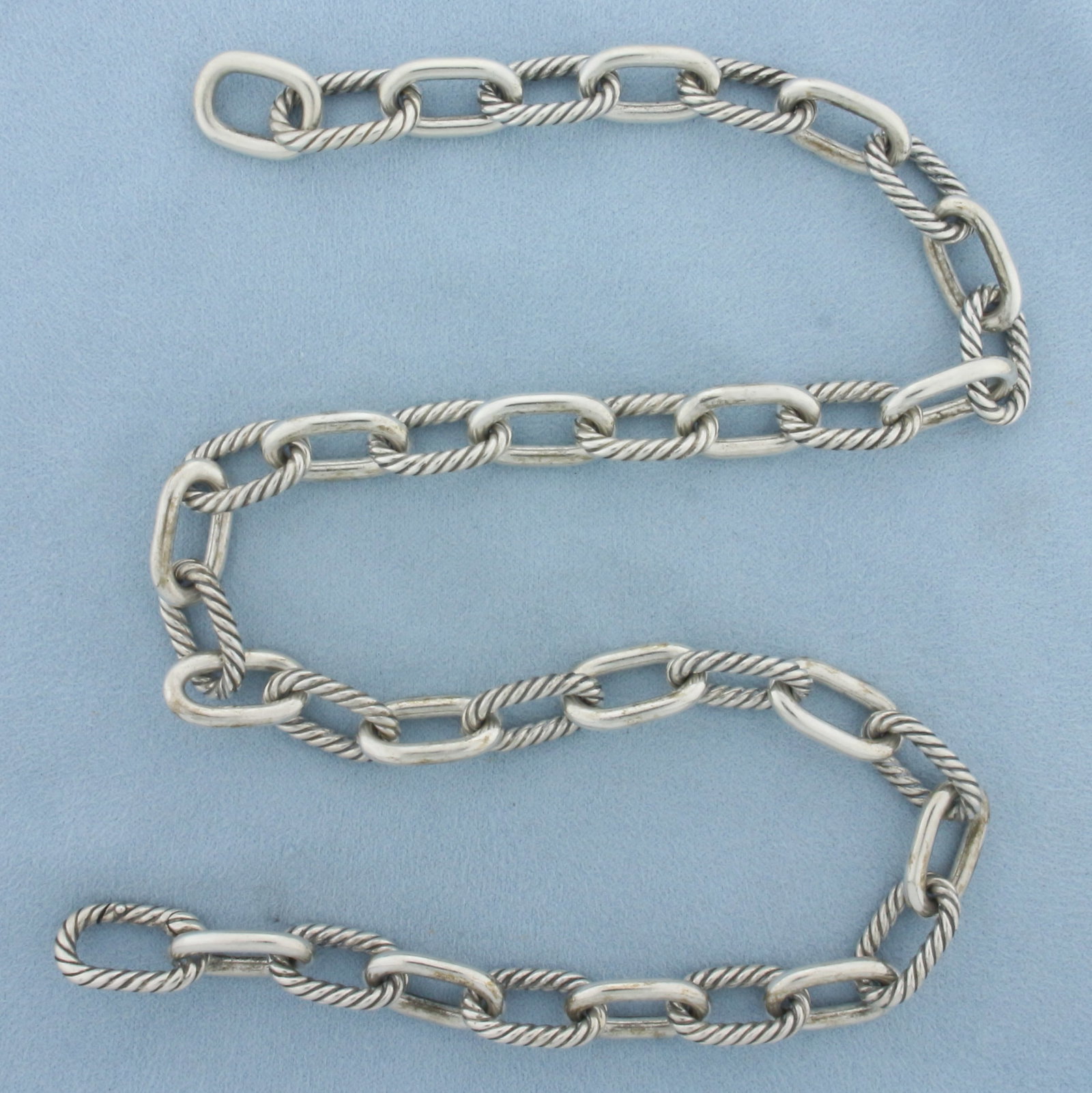 David Yurman Madison Chain Necklace in Sterling Silver: In .925 sterling silver. Guaranteed authentic. Measures 20 inches long and 11mm wide. Spring clasp. 103.6g.