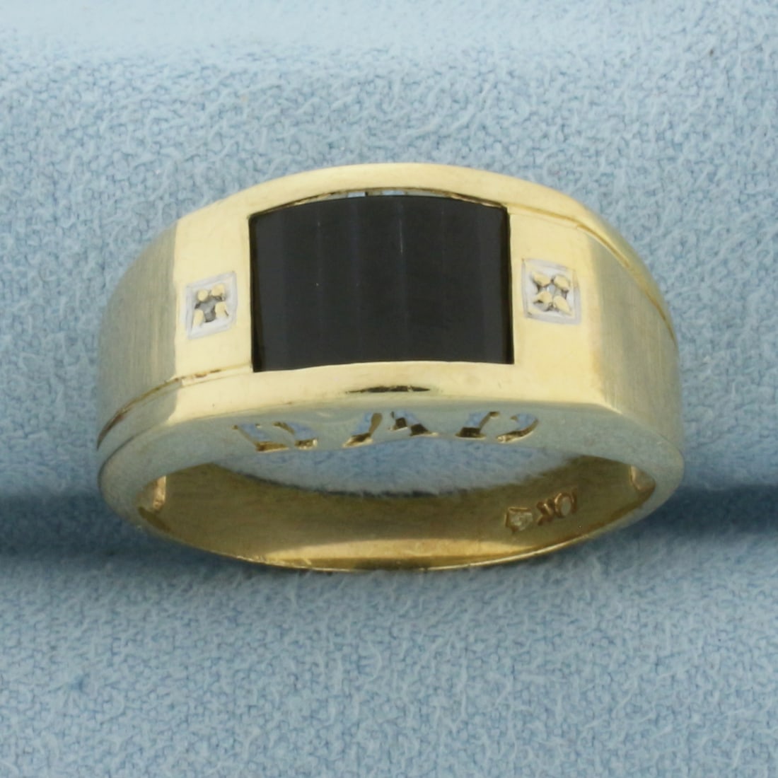 Onyx and Diamond DAD Ring in 10K Yellow Gold: In 10k yellow gold. 9.8mm wide at top of ring. Contains one 10mm Onyx gemstones. Also contains 2 high quality 1/2pt diamonds. Size 10. 3.6g.
