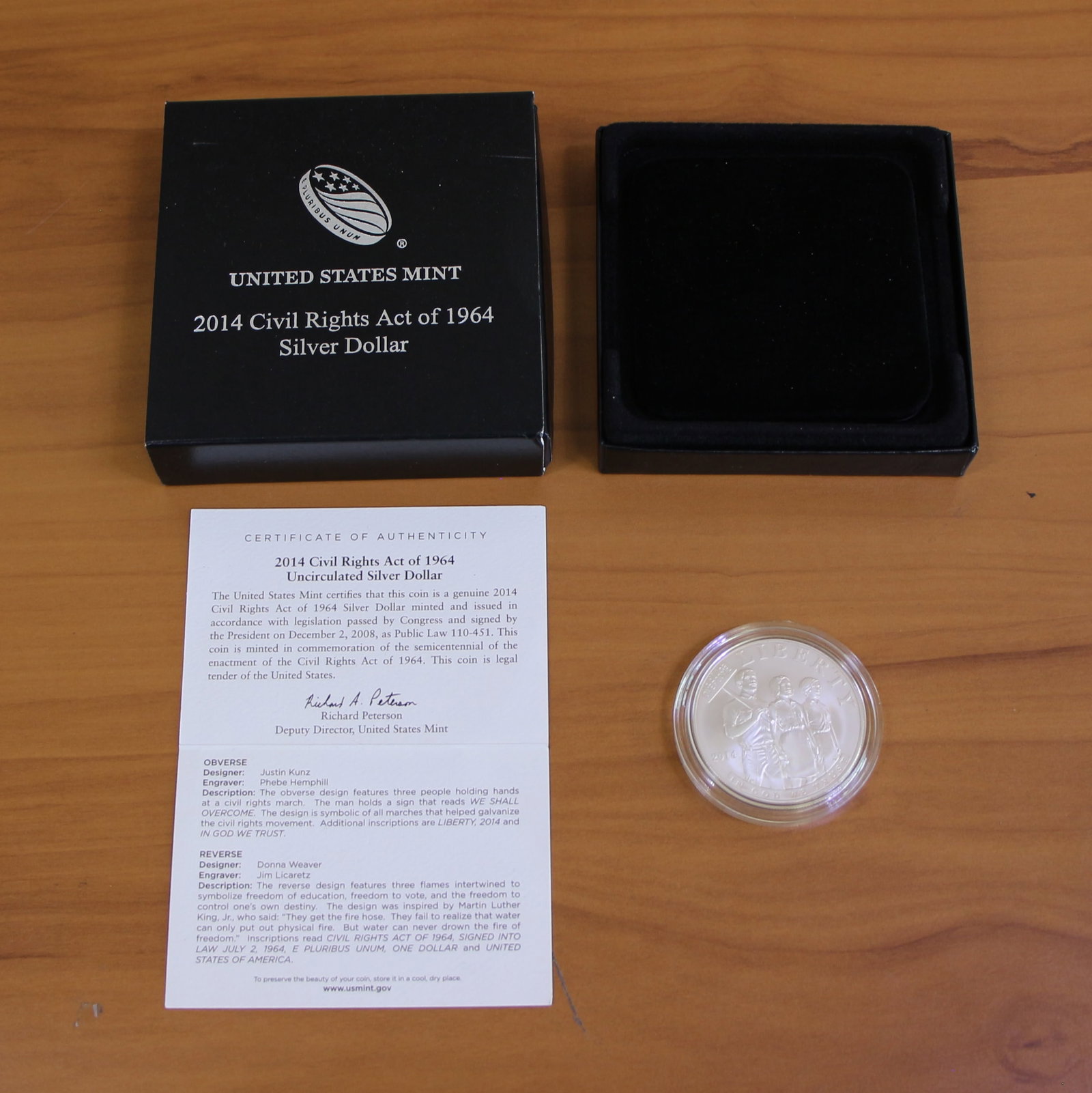 2014 US Mint Civil Rights Act of 1964 Silver Dollar Coin OGP: Contains one 2014 United States Mint Civil Rights Act of 1964 90% Silver Dollar. Set in original government packaging and contains certificate of authenticity.