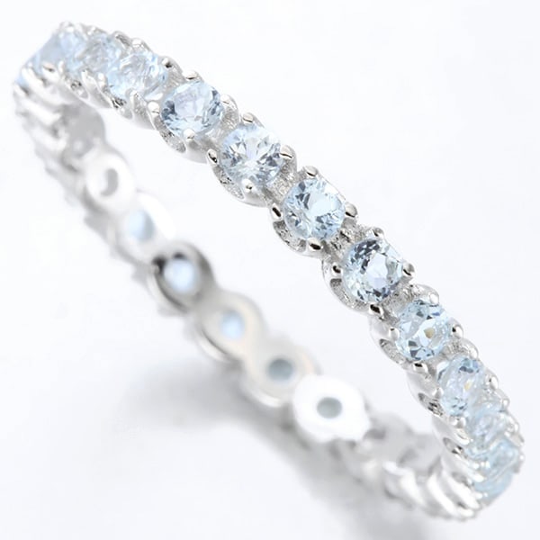 Sky Blue Topaz Eternity Stacking Band Ring in Sterling Silver: In platinum over .925 sterling silver. Contains 24 genuine sky blue topaz gemstones with very light blue color, 1.0ctw. Size 8. 1.7g