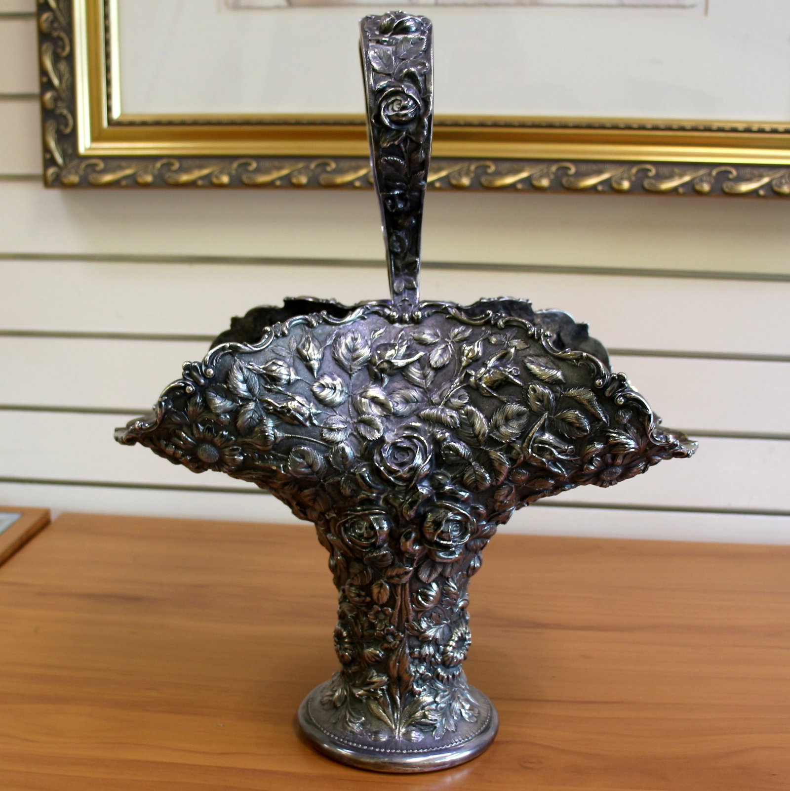 Antique Stieff "Baltimore Repousse" Sterling Silver Flower Bridal Basket: In .925 Sterling Silver. 18 inches tall. 14 inches wide. #502. Heavily chased floral design. Antique hand engraving at top of basket Handle from 1916. Great overall condition, no defects. 1,480g.