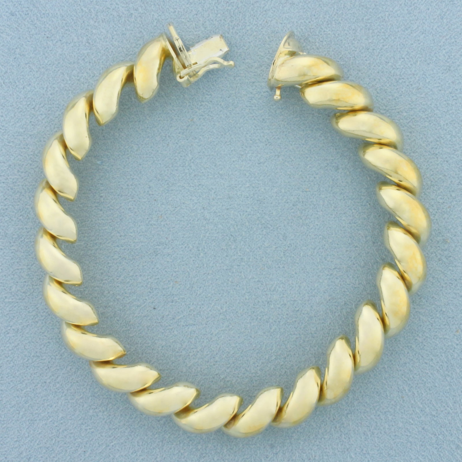 Italian San Marco Macaroni Bracelet: 18k Gold Plated Sterling Silver. 7 1/4 inches long. 3/8 inch wide. Concealed slide clasp with safety latch. 24.3g.