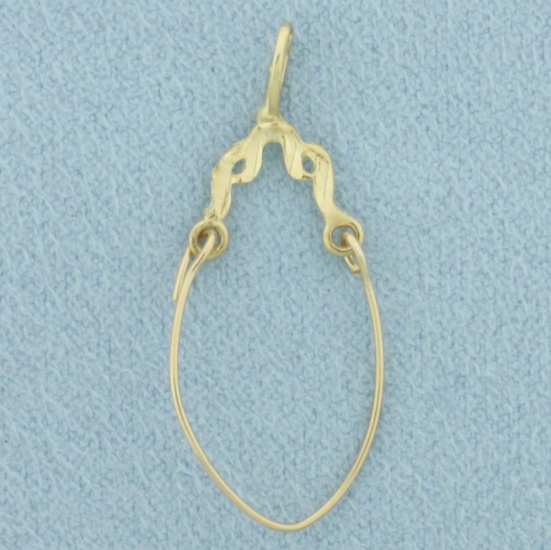 Charm Holder Pendant in 14k Yellow Gold: In 14k Yellow Gold. 1 1/8 inch long (including bale). 1/2 inch wide. .4g.