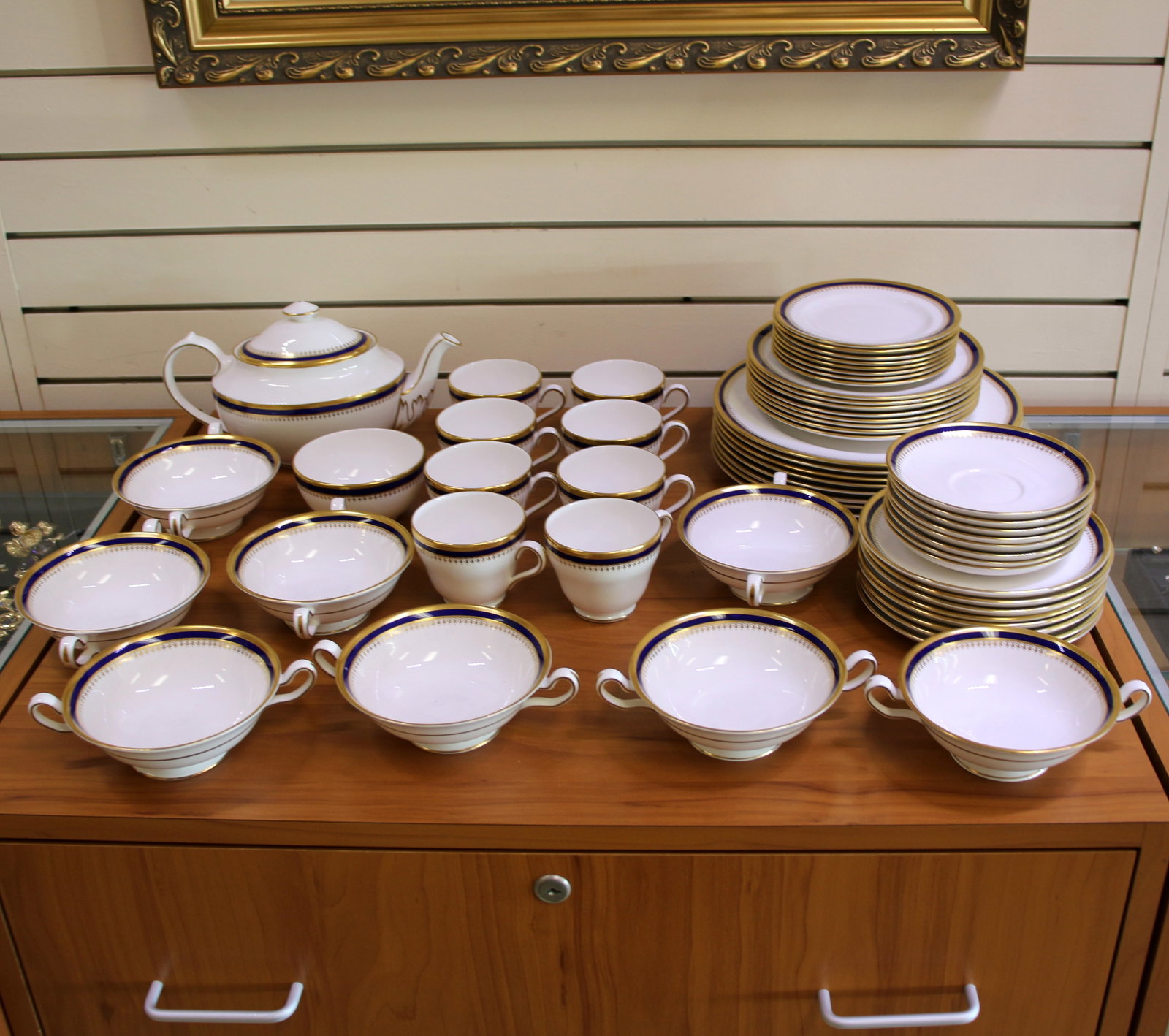 Spode Knightsbridge Cobalt Blue China Set of 58 Pieces: Contains eight dinner plates - 10 5/8 inches, eight salad plates - 8 inches, eight bread and butter plates - 6 1/4 inches, one oval teapot and lid, eight two-handle footed cream soup bowls - 5 3/8 inc