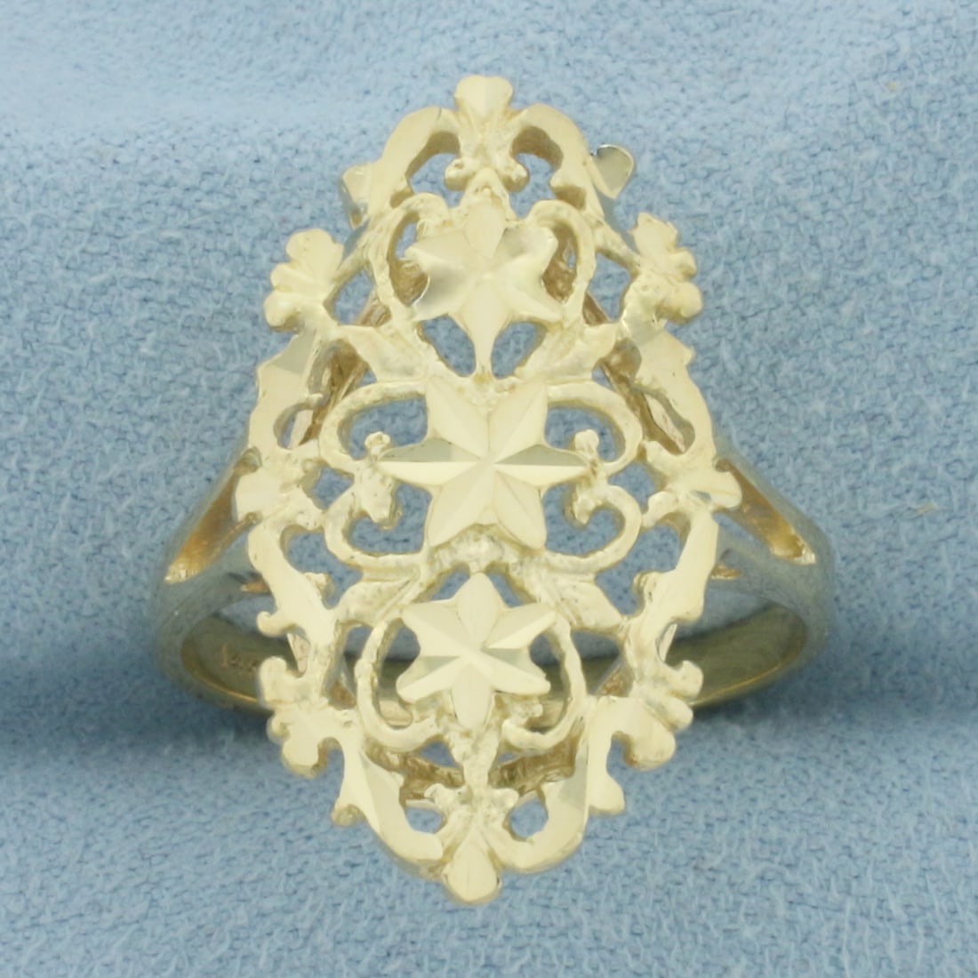 Star Design Filigree Ring in 14k Yellow Gold: In 14k Yellow Gold. 1 inch wide (at widest point). Size 10. 5.3g.