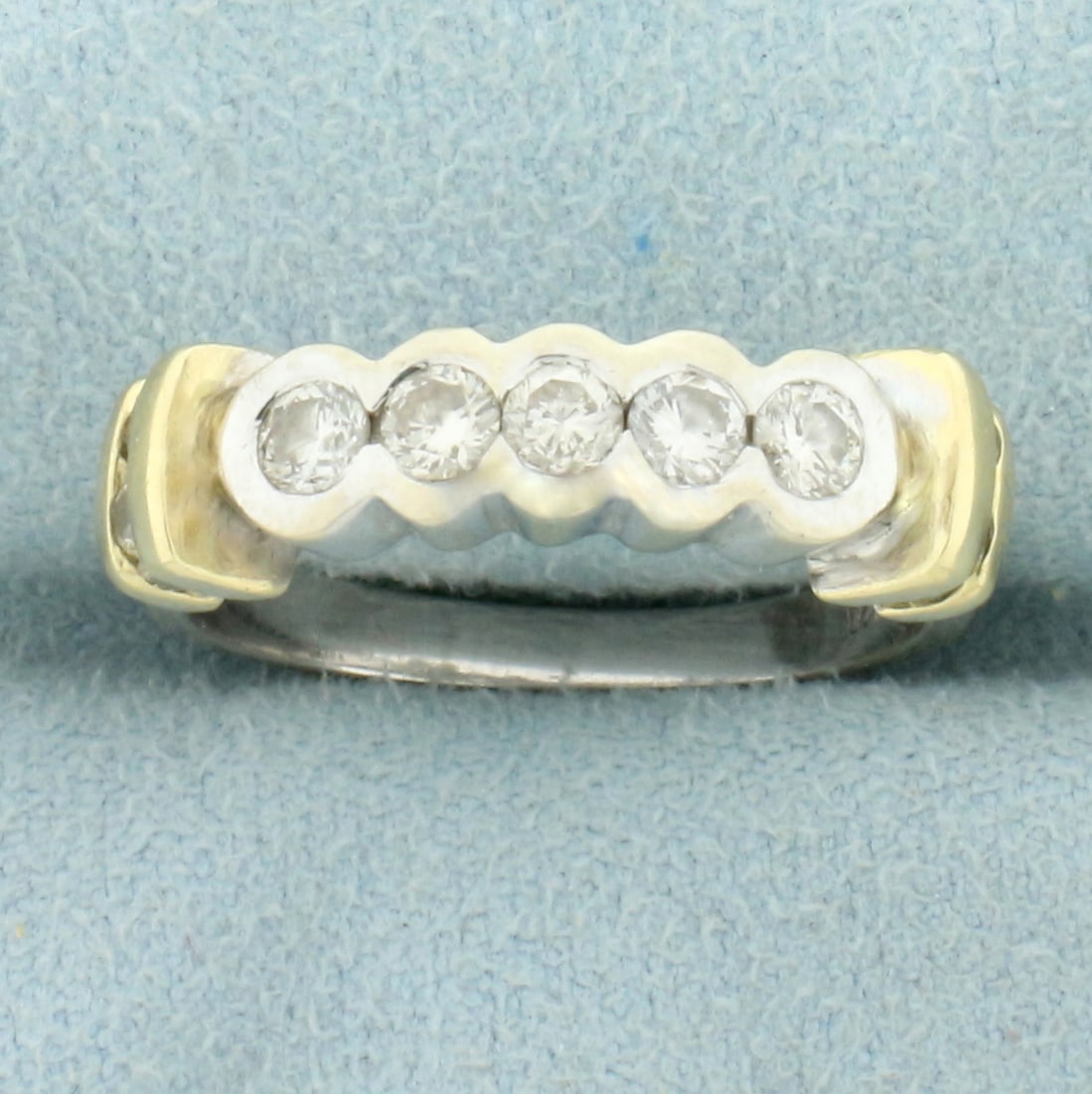 5 Stone Bezel Set Diamond Wedding or Anniversary Ring in 14K Yellow and White Gold: In 14K Yellow and White Gold. Contains five .1 ct diamonds and eight .03 ct diamonds, VS clarity/H color. Size 7. 4.6g