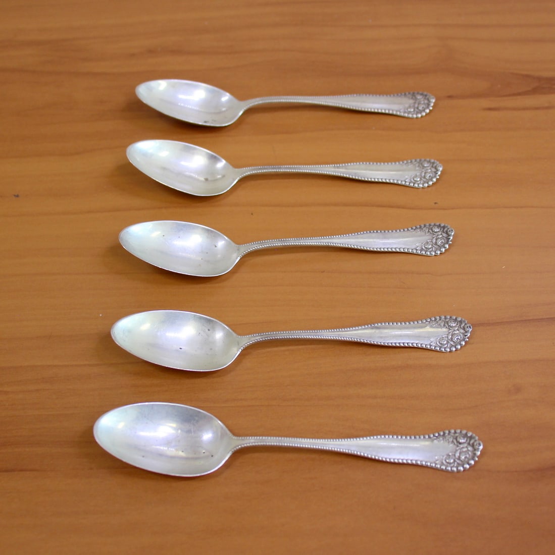 Gorham "Lancaster" Sterling Silver Teaspoons Set of 5: In .925 Sterling Silver. Contains five teaspoons. 5 7/8 inches long. 79.3g.
