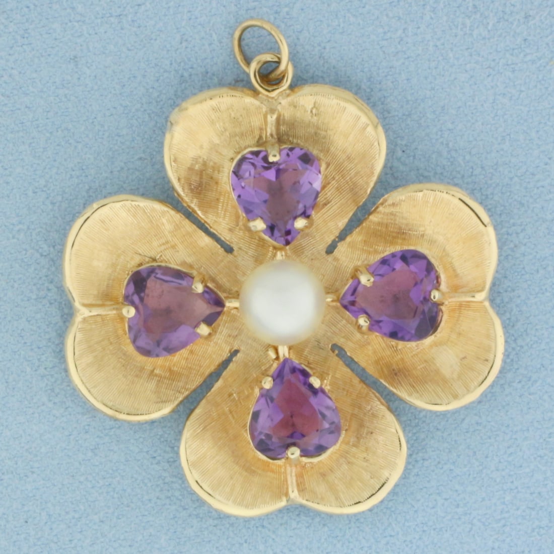 Heart Amethyst and Pearl Four Leaf Clover Pendant or Charmin 14k Yellow gold: In 14k yellow gold. 1.75 inches long (including jump ring) by 1.5 inches wide. Contains four high quality 9mm heart cut amethyst gemstones with vibrant color and excellent clarity. Also contains one h