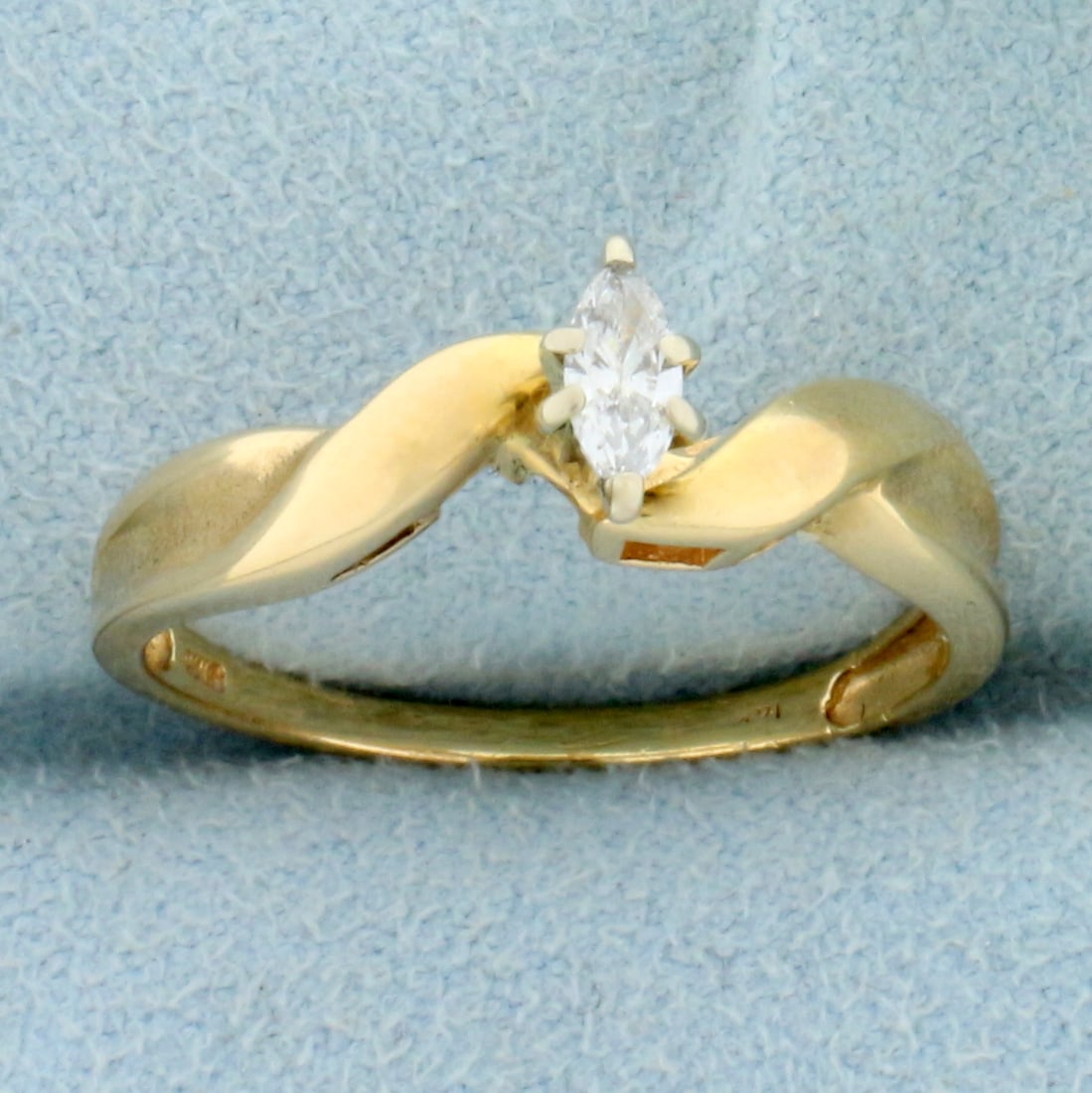 Vintage Designer Marquise Diamond Solitaire Engagement Ring in 14K Yellow Gold: In 14K Yellow Gold. Contains a high quality 1/4ct marquise cut Diamond, VS clarity/G color, great cut for added brilliance. Size 8 3/4. 2.8g
