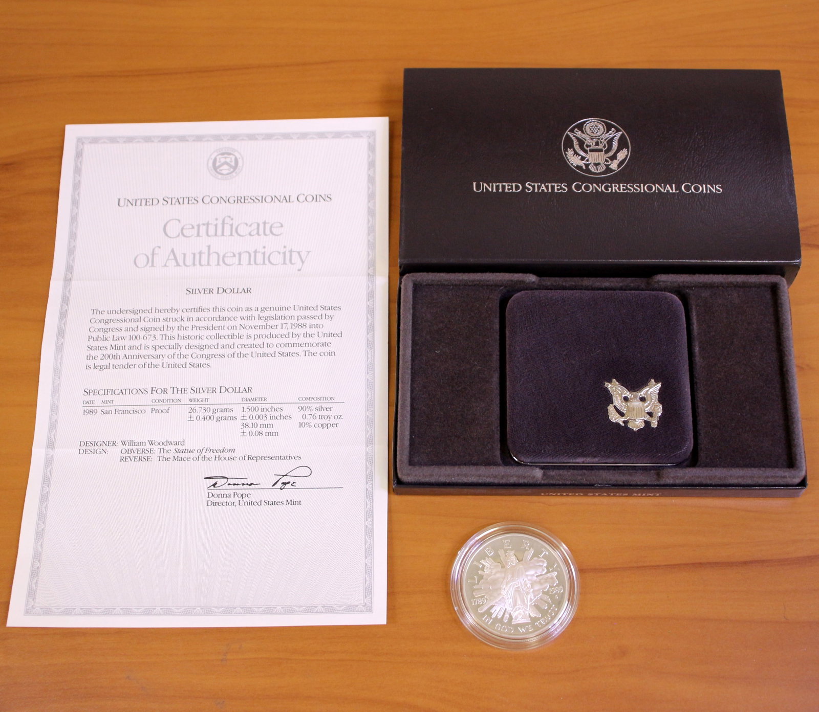 US Mint Congressional Silver Dollar Proof Coin OGP: Contains one 1989 United States Mint Commemorative Silver Dollar. Set in original packaging and contains certificate of authenticity.