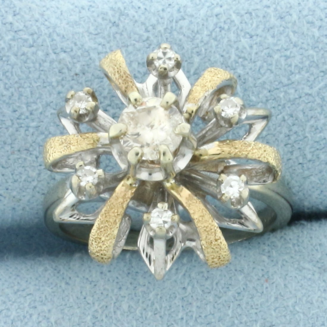 Vintage Diamond Target Ring in 14k White and Yellow Gold: In 14k White and Yellow Gold. Contains one 1/2ct high quality diamond, L color/I clarity. Also contains six high quality .02ct diamonds, I color/SI clarity. 18 mm wide at center. Size 6.5. 6.0g.