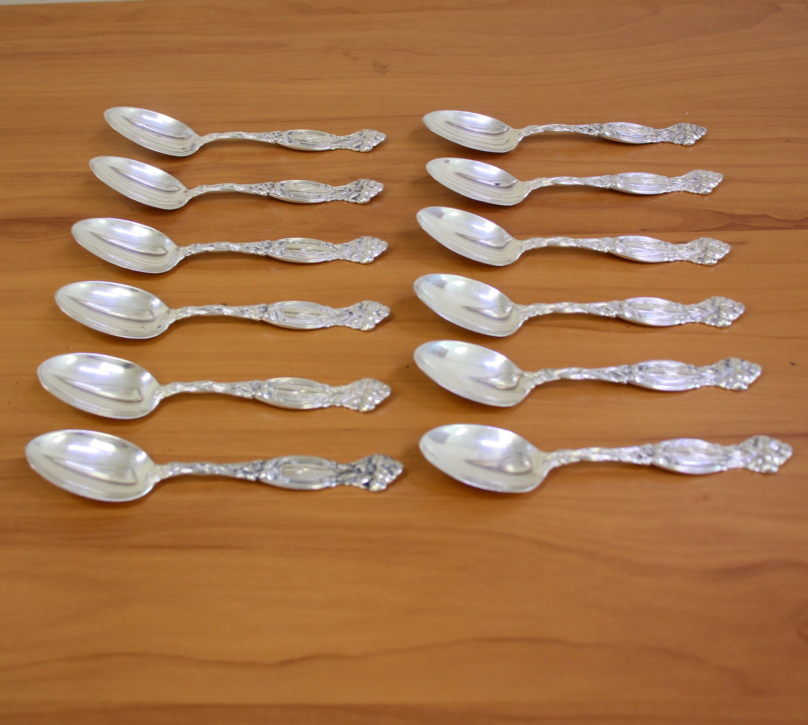 International Silver "Frontenae" Sterling Silver Teaspoons Set of 12: In .925 Sterling Silver. Contains twelve teaspoons - 5 7/8 inch. "H" monogram. 301.5g.