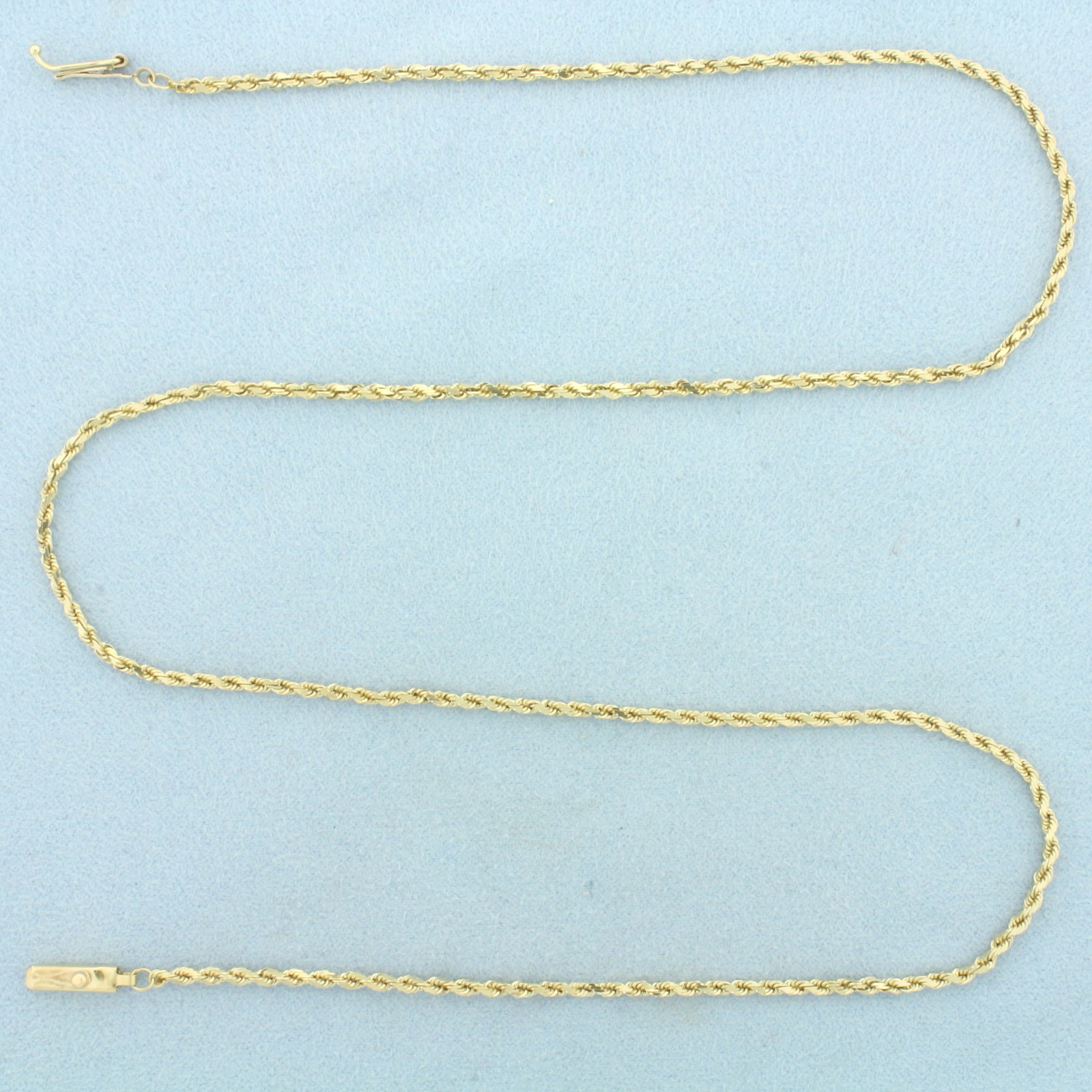 Italian 20 Inch Rope Link Chain Necklace in 14k Yellow Gold: In 14k Yellow Gold. 20 inches long. 2mm wide. Italian made. Slide clasp with safety latch. 7.2g.