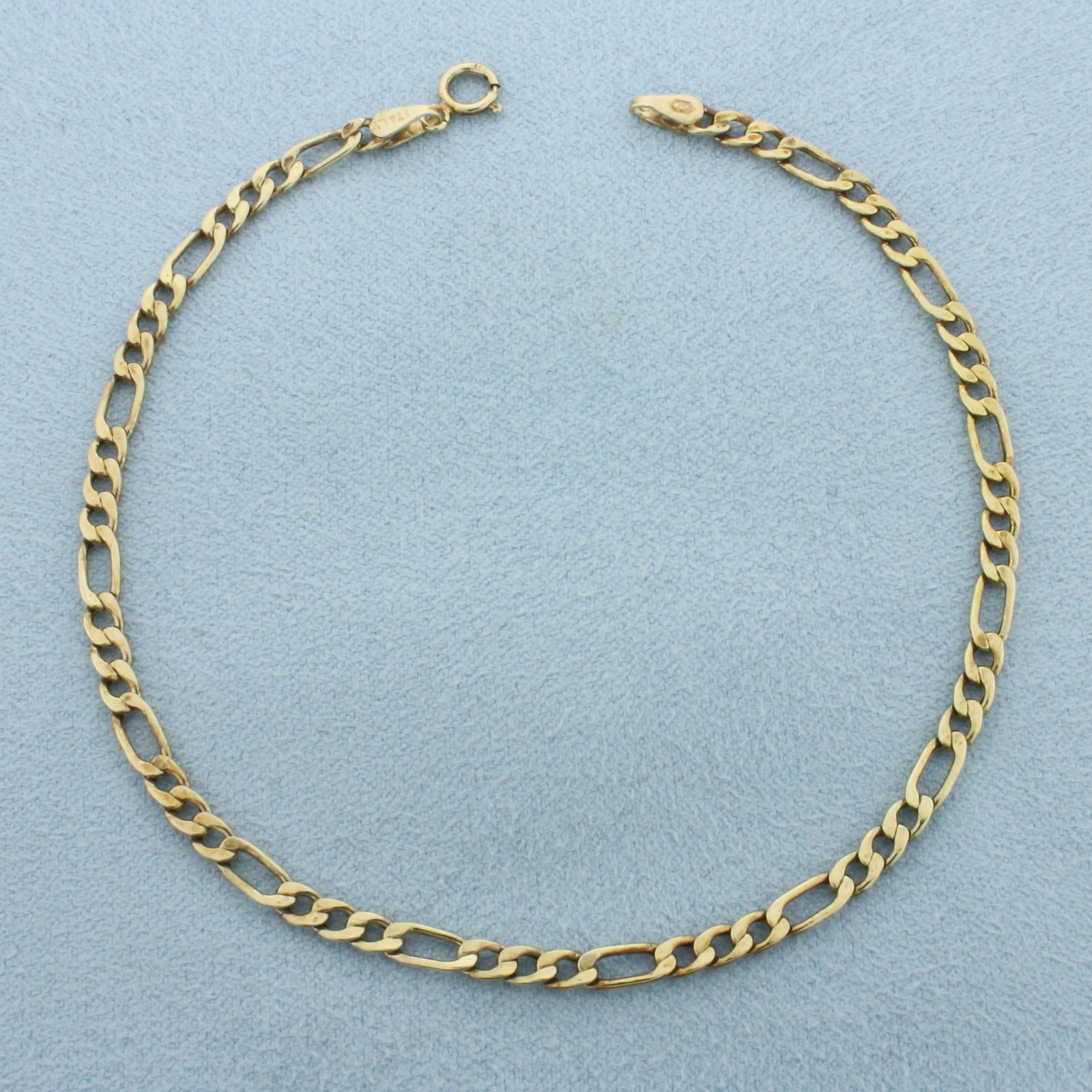 Italian Figaro Bracelet in 10k Yellow Gold: In 10k Yellow Gold. 8 inches long. 3.2mm wide. Italian made. Spring clasp. 1.2g.