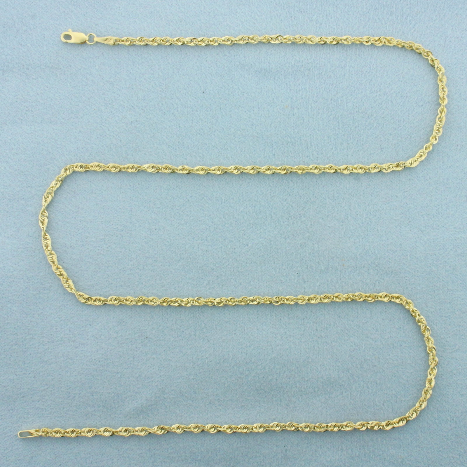 18 Inch Rope Link Chain Necklace in 10k Yellow Gold: In 10k Yellow Gold. 18 inches long. 2.2mm wide. Lobster clasp. 1.5g.