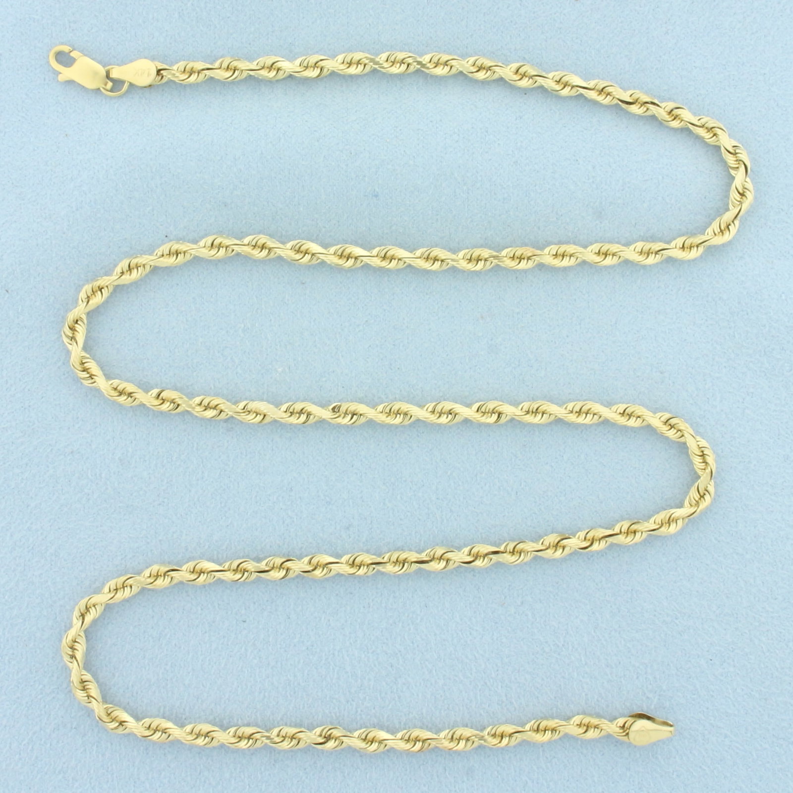 20 Inch Diamond Cut Rope Link Chain Necklace in 14k Yellow Gold: In 14k Yellow Gold. 20 inches long. 3.3mm wide. Lobster clasp. 14.9g.