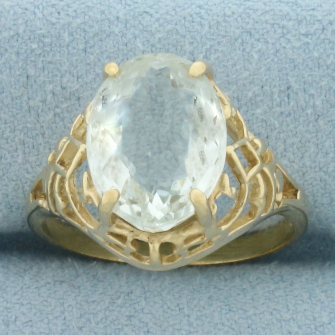 Vintage Aquamarine Filigree Ring in 14k Yellow Gold: In 14k Yellow Gold. Contains one 13x10mm high natural Aquamarine gemstone, approximately 4cts, with bright color and excellent clarity. Size 8.5. 4.3g.