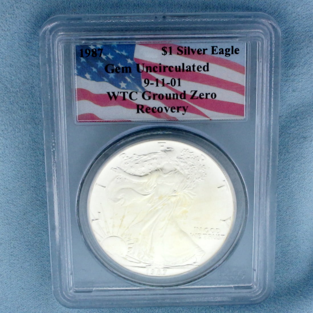 WTC Ground Zero Recovery Silver Eagle Coin PCGS: 1987 or 1993 Gem Uncirculated Condition. 9/11/2001 WTC Ground Zero Recovery $1 Silver Eagle Coin.