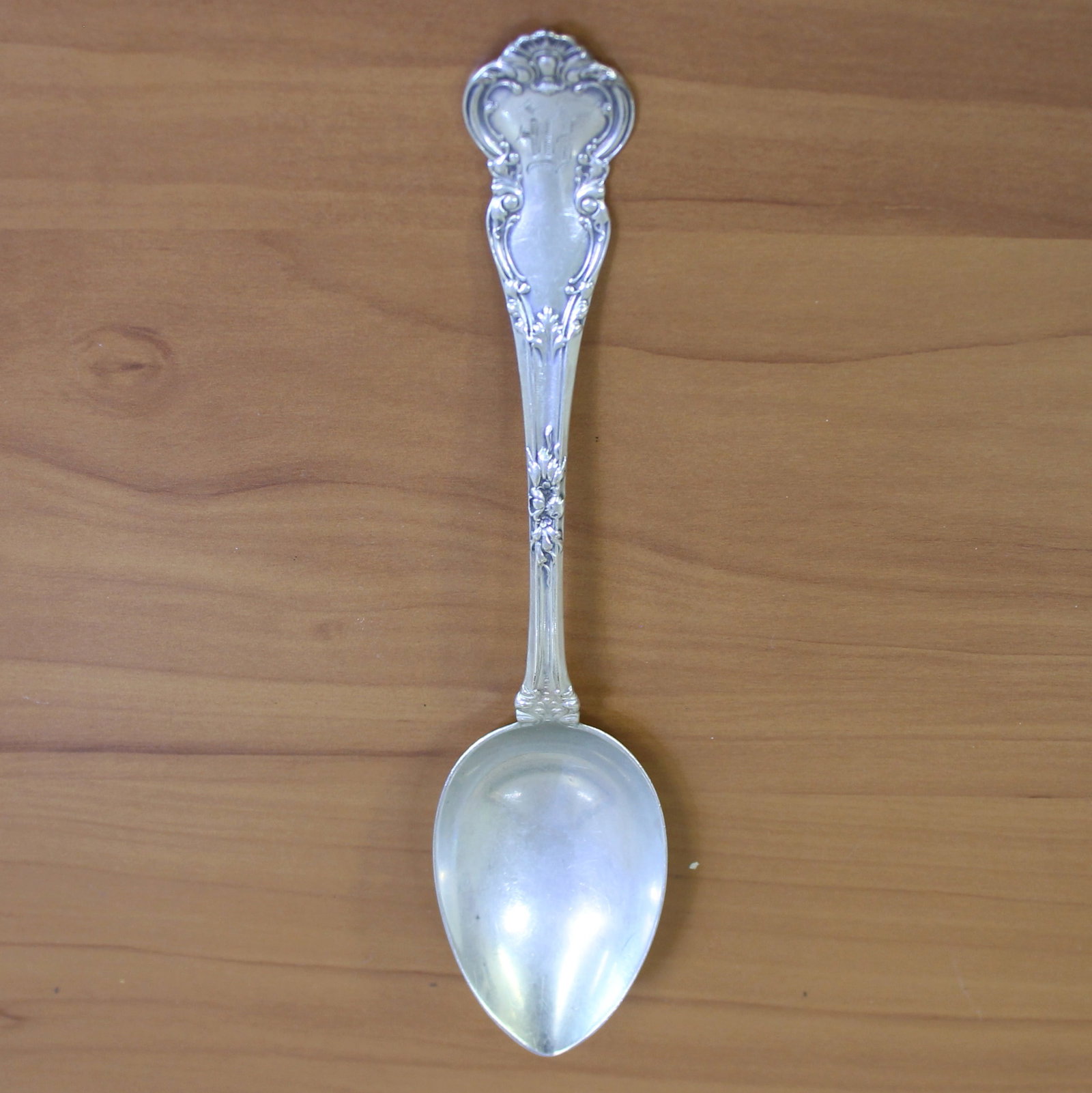 Antique Wendell Manufacturing Co Lombardy Sterling Silver Serving Tablespoon: In .925 Sterling Silver. Circa 1885. Contains one serving spoon, 8 1/8 inches long (light "B" monogram). 66.1g.