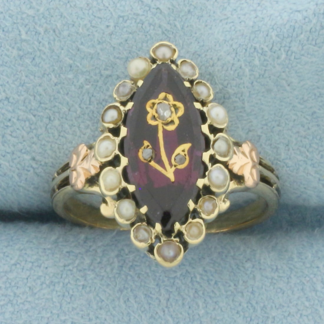 Antique Diamond, Pearl, and Amethyst Flower Ring in 14k Yellow and Rose Gold: In 14k Yellow and Rose Gold. Contains one 14mm high quality marquise cut natural Amethyst gemstone with intense color. Also contains three .01cct high quality old mine cut diamonds. Also contains sixt