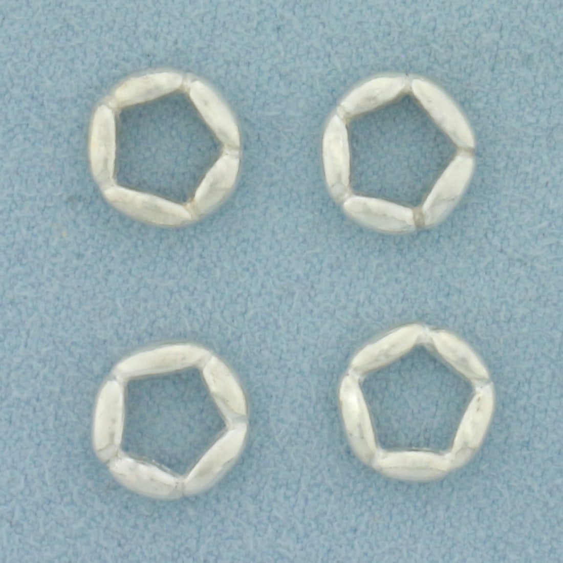 Pandora Elegant Embrace Spacer Beads Set of 4 in Sterling Silver: In .925 Sterling Silver. Contains four spacer beads. 3/8 inch diameter. Elegant embrace #790589.