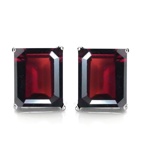 6x8 Emerald Cut Garnet Earrings in Sterling Silver: In platinum over .925 sterling silver basket mountings with friction backs included. Contains 2 emerald cut Garnet gemstones with excellent color and clarity, approx. 4CTW, 6x8mm each. 2.2g