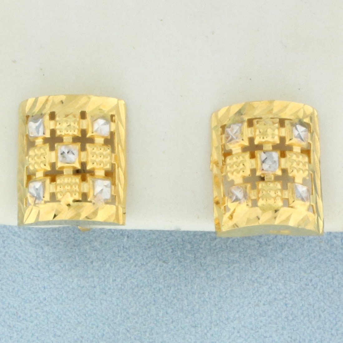 Diamond Cut Two Tone Button Earrings in 21k Yellow and White Gold: In 21k Yellow and White Gold. 1/2 inch long. 3/8 inch wide. Never worn. Friction backs. 3.5g.