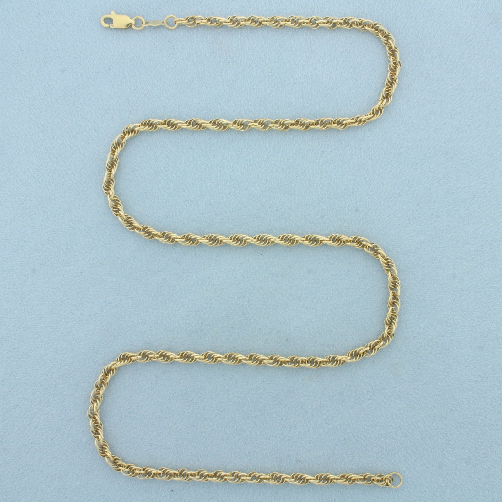 21 Inch Rope Link Chain Necklace in 14k Yellow Gold: In 14k Yellow Gold. 21 inches long. 3.6mm wide. Lobster clasp. 13.9g.