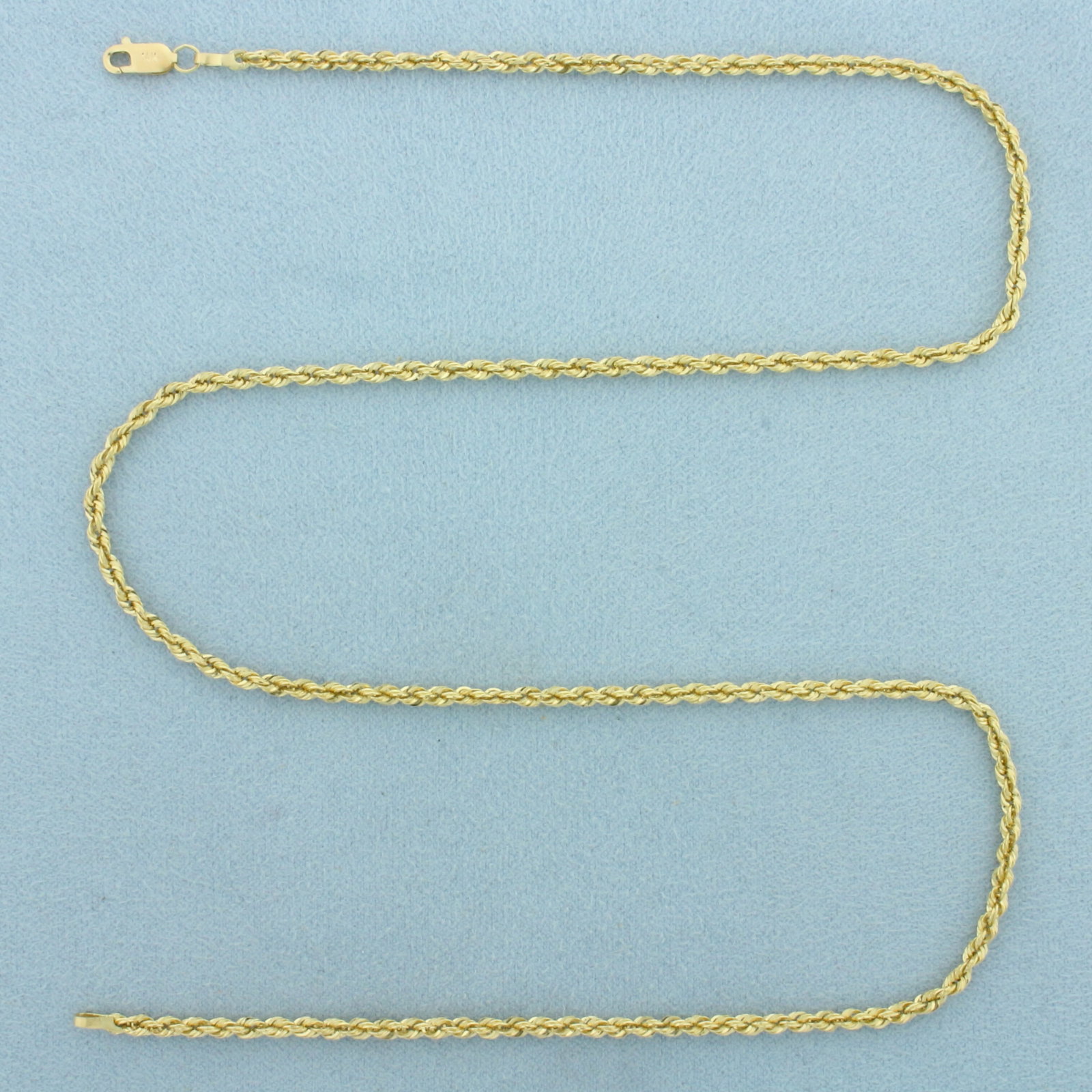 18 Inch Rope Link Chain Necklace in 14k Yellow Gold: In 14k Yellow Gold. 18 inches long. 2.3mm wide. Lobster clasp. 2.5g.