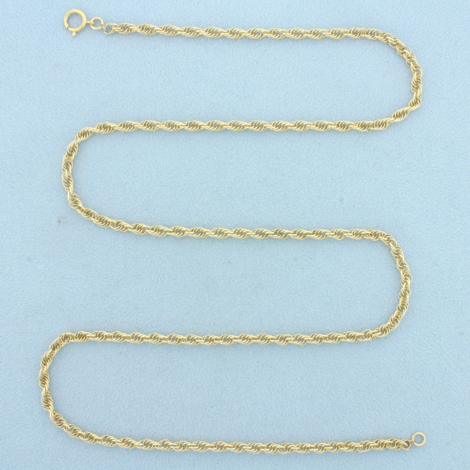 24 Inch Twisting Rope Link Chain Necklace in 14k Yellow Gold: In 14k Yellow Gold. 24 inches long. 3.2mm wide. Spring clasp. 11.9g.