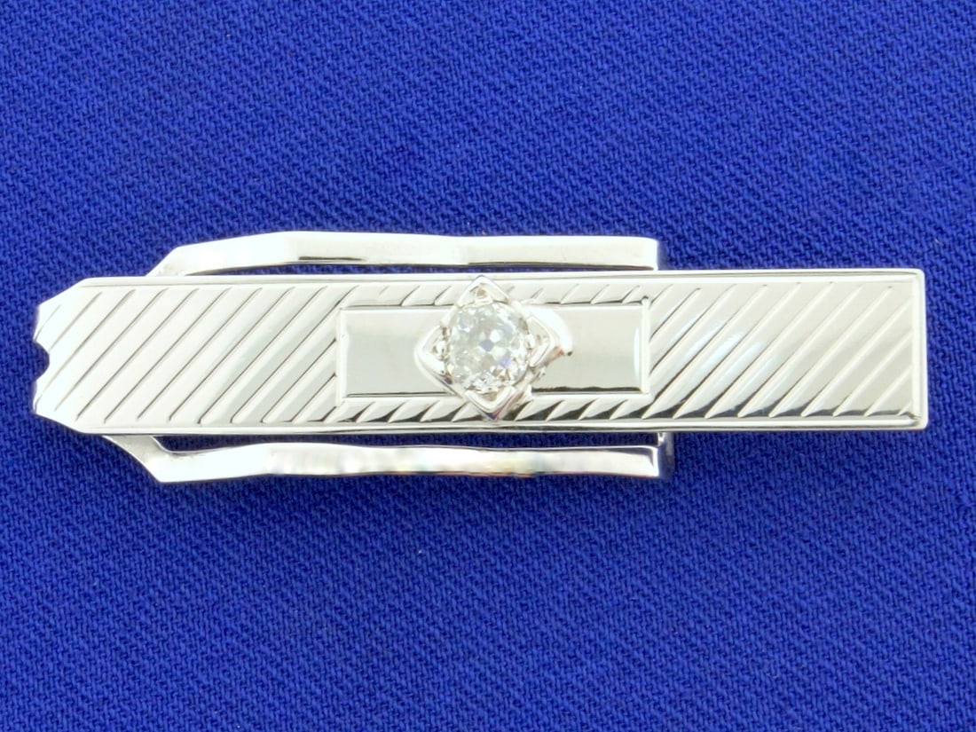 Vintage Old European Cut Diamond Tie Clip in 10k White Gold: In 10k white gold. Diamond is a high quality 1/2ct Old European Cut, SI2 clarity/G color. 1 7/8 inches long. 4.1g.