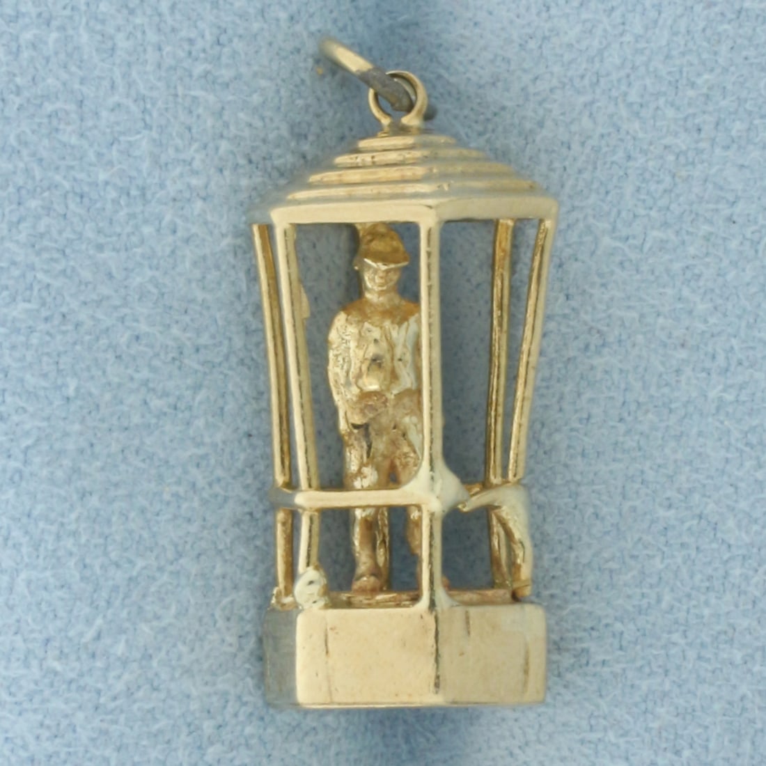 Vintage Bermuda Bobby Policemen Charm in 9k Yellow Gold: In 9k Yellow Gold. 1 1/8 inch long (including jump ring). 1/2 inch wide. One area of horizontal rail missing, indicative of age. 4.6g.