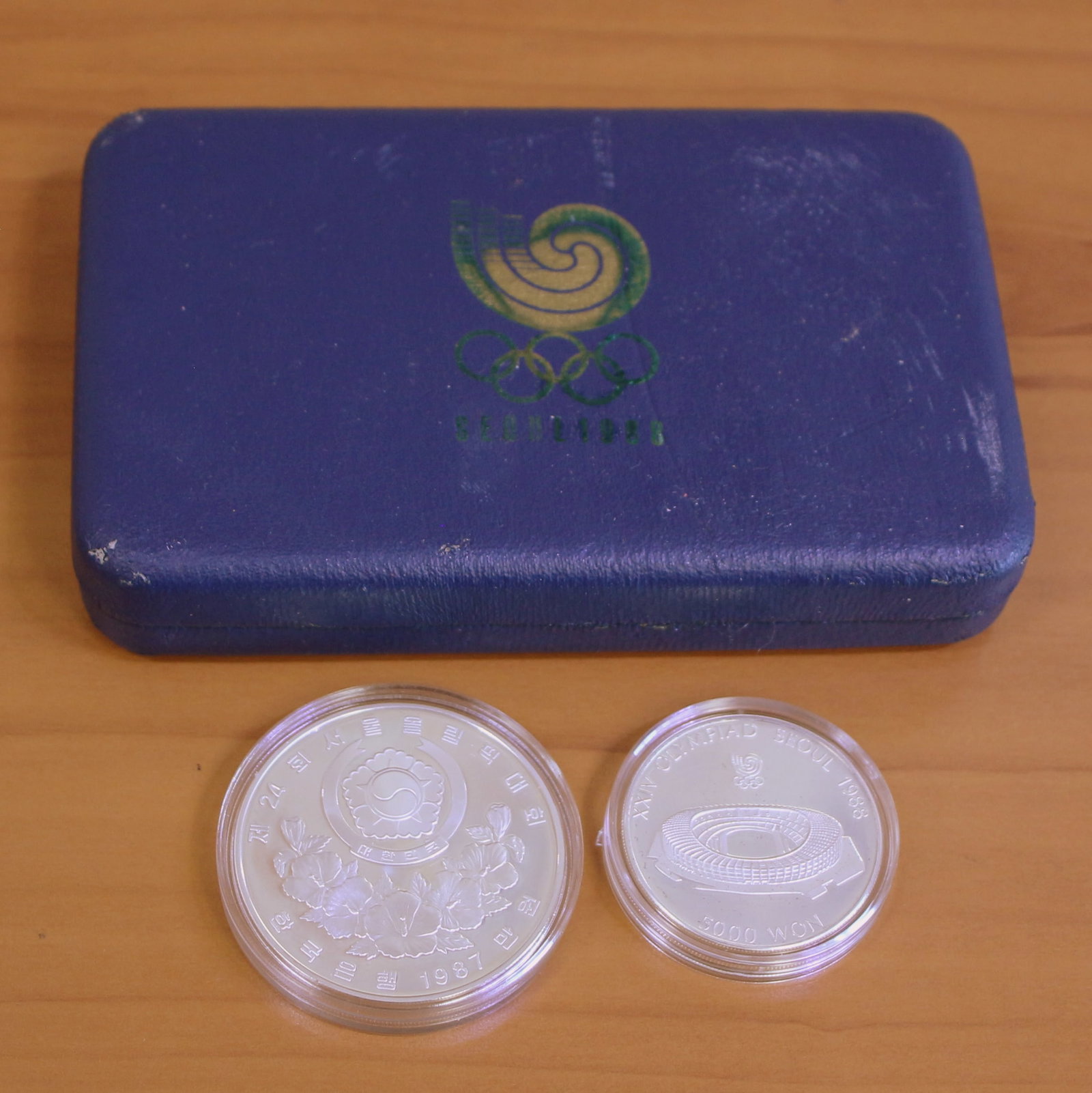 1988 South Korea Seoul Olympics Proof Two Silver Coin Set OGP: Contains one 1988 Silver South Korea Seoul Olympics Proof 2-Coin Set. Set in original government packaging.