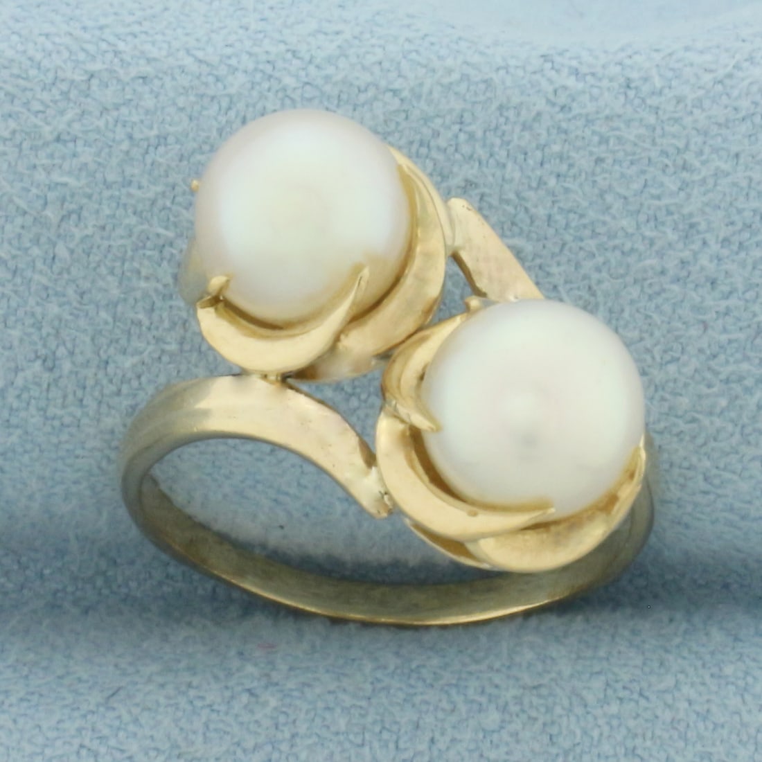 Cultured Akoya Pearl Toi et Moi Ring in 10k Yellow Gold: In 10k Yellow Gold. Contains two 7.5mm high quality Cultured Akoya Peals with high luster. Size 7.25. 4.4g.
