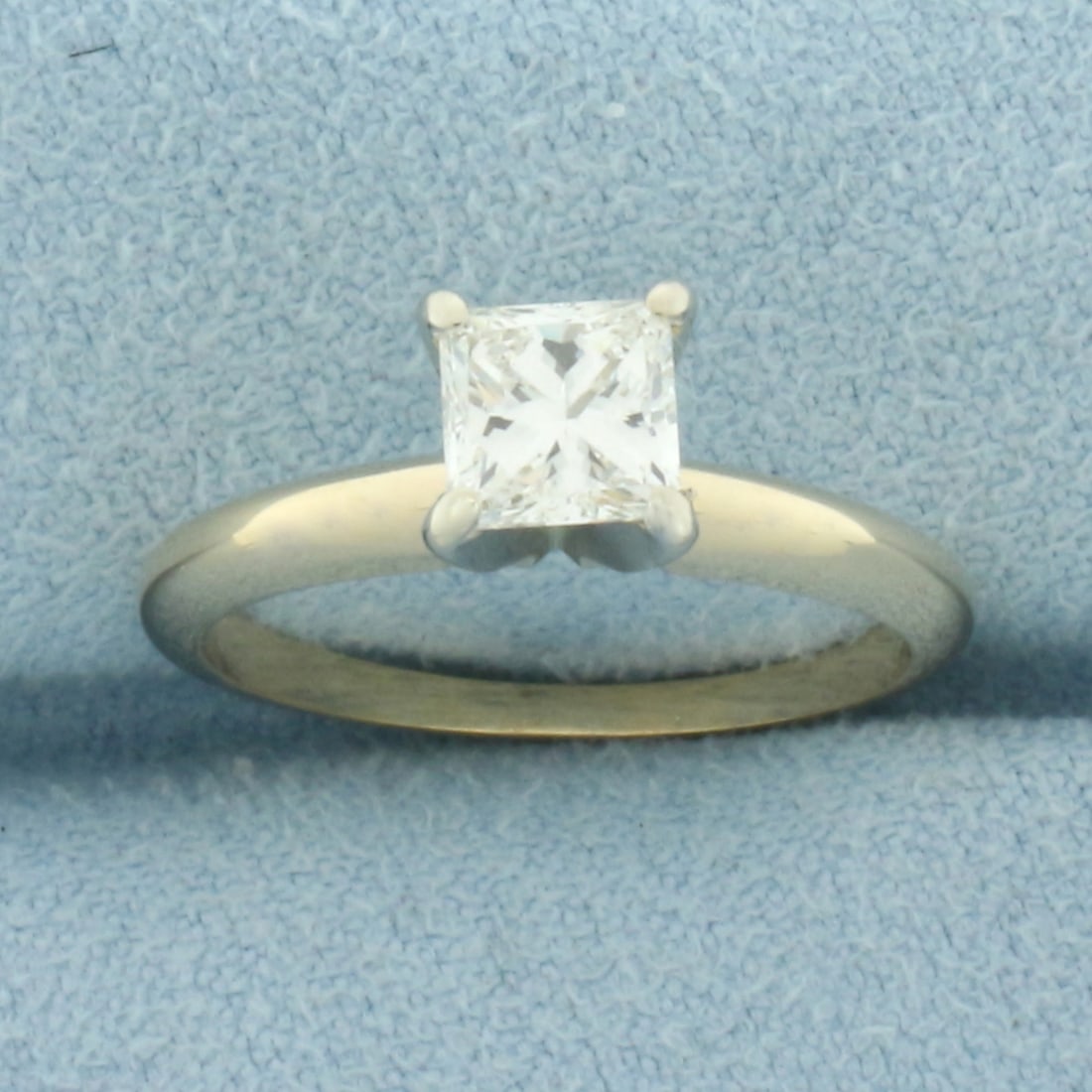 Princess Cut Diamond Solitaire Engagement Ring in 14k Yellow Gold: In 14k Yellow Gold. Contains one 5mm 3/4ct high quality princess cut diamond, VS clarity/H color, great cut for added brilliance. Size 6. 2.8g.