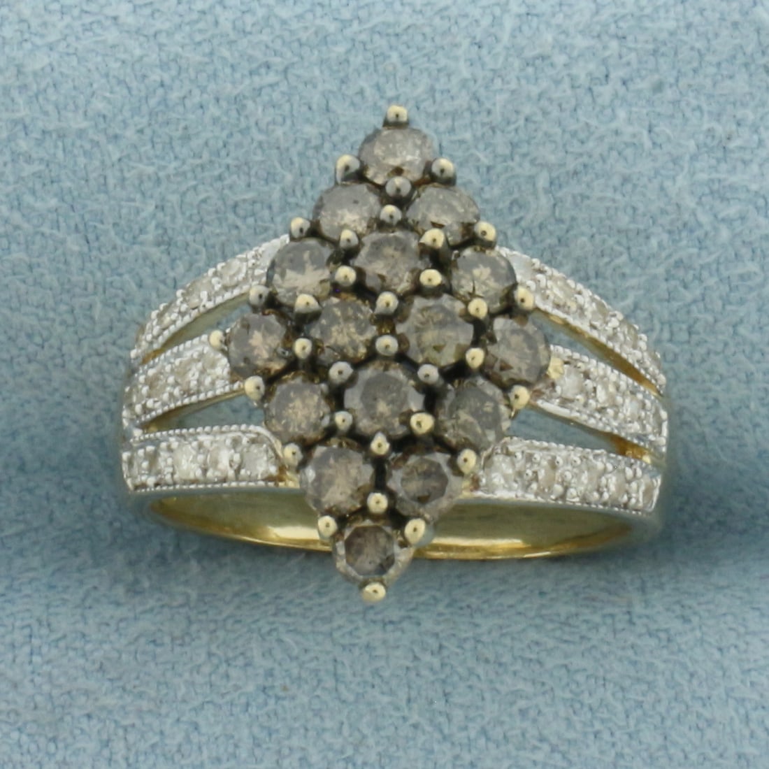 Chocolate and White Diamond Ring in 10K Yellow Gold: In 10K Yellow Gold. 17mm wide at top of ring. Contains sixteen high quality chocolate diamonds, 1ct total weight, with warm color. Also contains twenty-eight high quality "white" 1/2pt diamonds. Size 