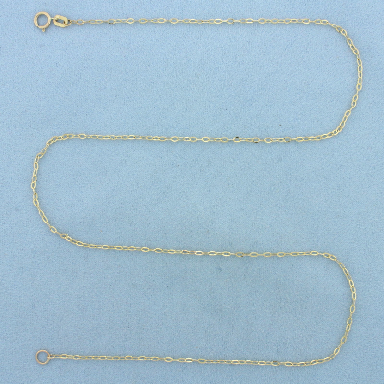 20 Inch Cable Link Chain Necklace in 14k Yellow Gold: In 14k Yellow Gold. 20 inches long. 2mm wide. Spring clasp. 1.1g.