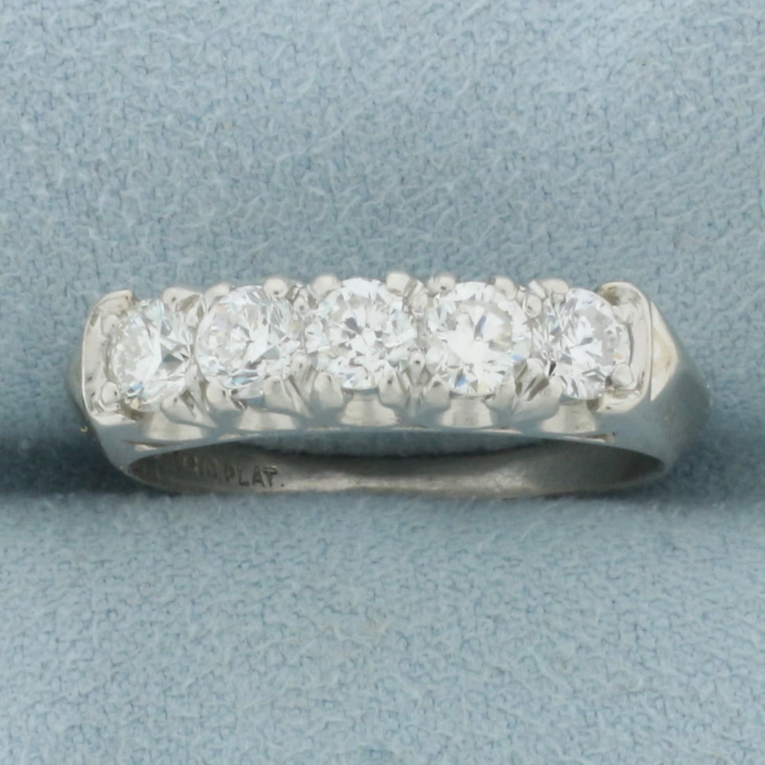 5 Stone Anniversary or Wedding Band Ring in Platinum: In platinum. Contains five high quality diamonds, 1ct TW, VS clarity/G color. Size: 8.5. 5.2g.