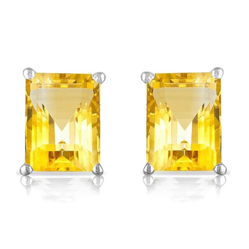 6x8 Emerald Cut Citrine Earrings in Sterling Silver: In platinum over .925 sterling silver basket mountings with friction backs included. Contains 2 emerald cut Citrine gemstones with excellent color and clarity, approx. 3CTW, 6x8mm each. 1.8g