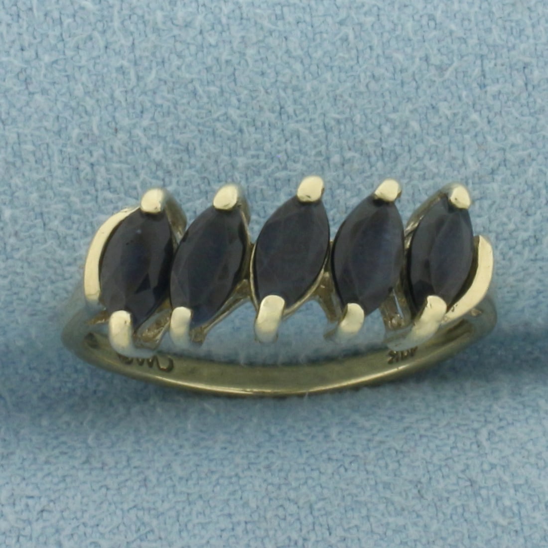 Midnight Sapphire 5-Stone Ring in 10k Yellow Gold: In 10k Yellow Gold. Contains five 6mm high quality marquise cut natural Sapphire gemstones, with deep midnight blue color. Size 7. 2.3g.