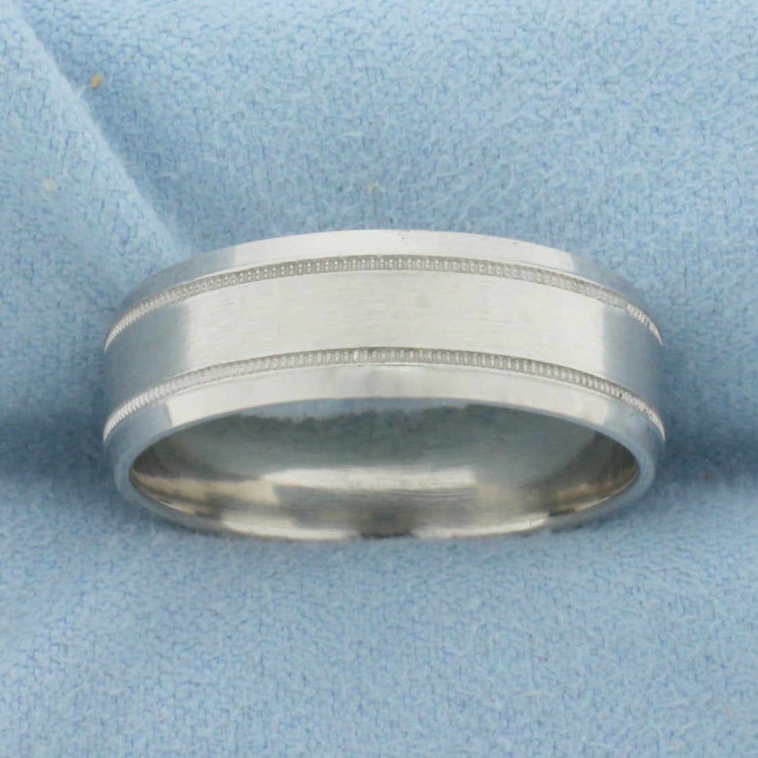 Men's Wedding Band Ring in 10k White Gold: In 10k White Gold. 7mm wide. Size 11. 7.1g.