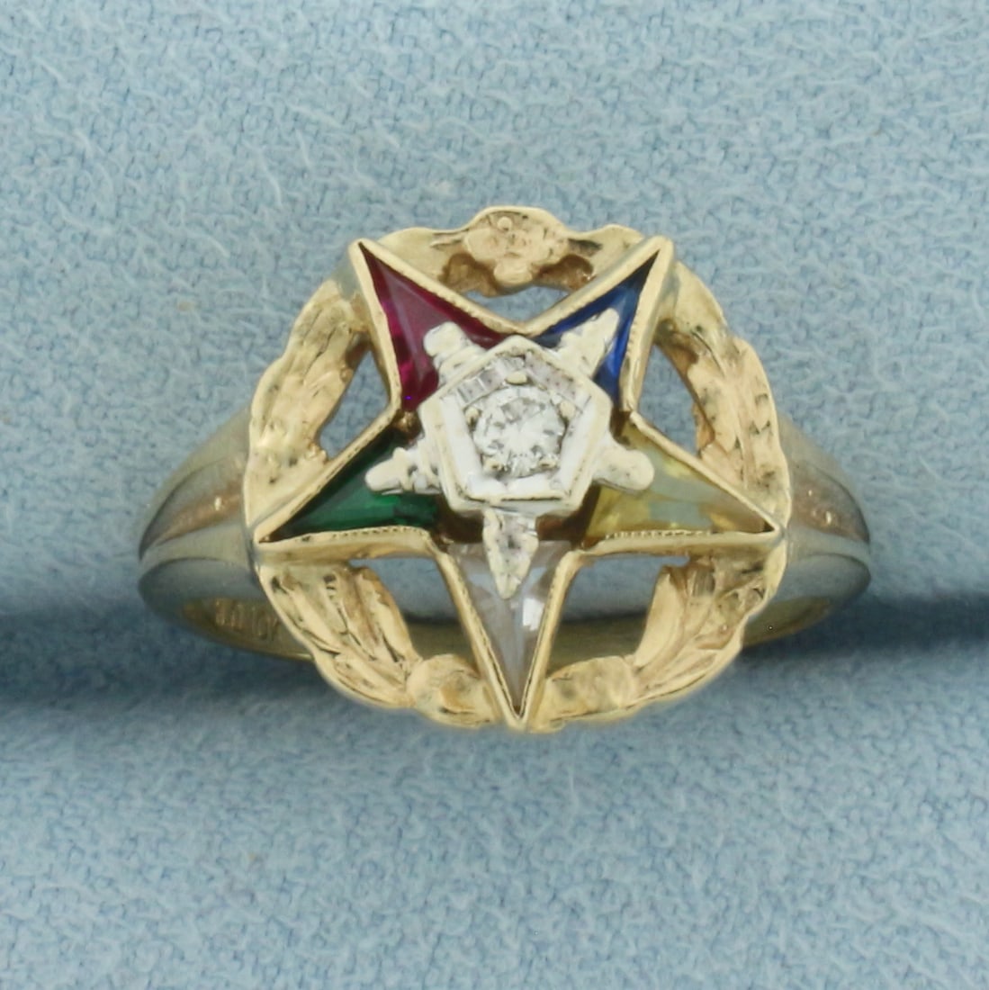 Diamond Masonic Eastern Star Ring in 10k Yellow Gold: In 10k Yellow Gold. Contains one .05ct high quality diamond, VS clarity/H color. 14mm wide at top of ring. Size 6.5. 3.9g.
