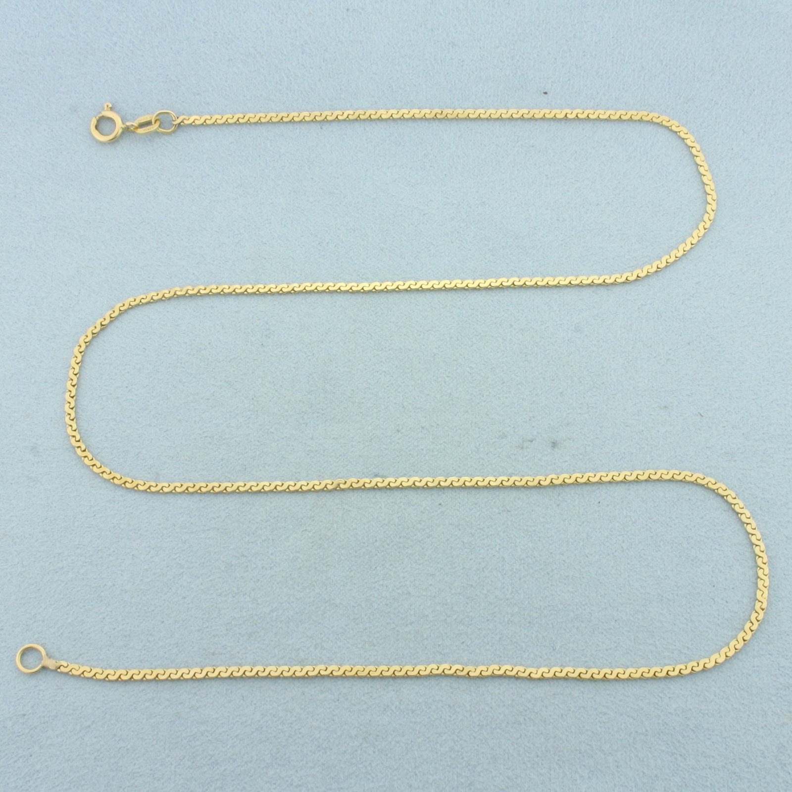 Italian 20 Inch S-Link Chain Necklace in 14k Yellow Gold: In 14k Yellow Gold. 20 inches long. 1.7mm wide. Made in Italy. Spring clasp. 5.3g.